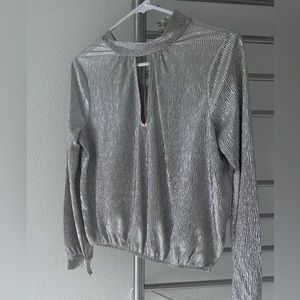 Express long sleeve metallic top.